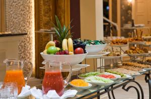 a buffet of different types of food on a table at Limak Eurasia Luxury Hotel in Istanbul