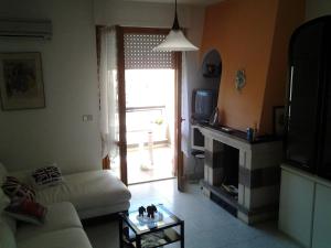 A television and/or entertainment centre at Casa Baleari 28C