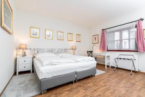 Rúm í herbergi á Hotel Dvur Hoffmeister