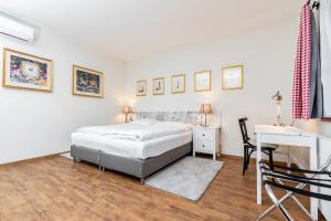 Rúm í herbergi á Hotel Dvur Hoffmeister