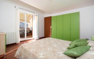 Ein Bett oder Betten in einem Zimmer der Unterkunft Oliva Holiday Apartment