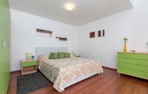 Ein Bett oder Betten in einem Zimmer der Unterkunft Oliva Holiday Apartment