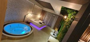 an overhead view of a large jacuzzi in a house at Hotel Ramka & Restaurant & Wine Bar in Poznań