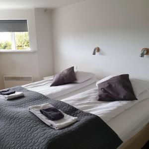 Letto o letti in una camera di Guesthouse Carina