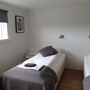 Letto o letti in una camera di Guesthouse Carina