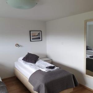 Letto o letti in una camera di Guesthouse Carina