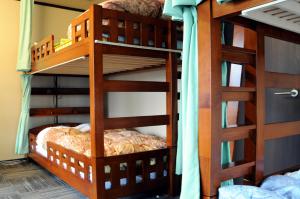 Voodi või voodid majutusasutuse Sakura Guest House toas