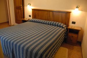 Postel nebo postele na pokoji v ubytování Hotel Margaret