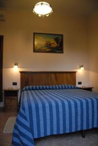 Postel nebo postele na pokoji v ubytování Hotel Margaret