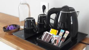 Set per la preparazione di tè e caffè presso Mantra Gili