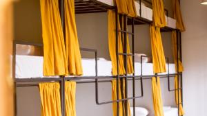 Μία ή περισσότερες κουκέτες σε δωμάτιο στο Karma Hostel