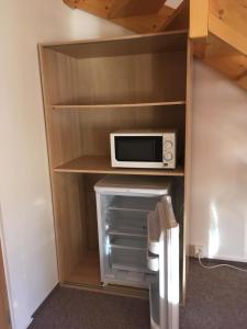Kuchyň nebo kuchyňský kout v ubytování Chaty Marta