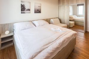 Ένα ή περισσότερα κρεβάτια σε δωμάτιο στο Apartman Michaela