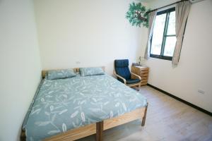 Postel nebo postele na pokoji v ubytování Tree House Café & Homestay