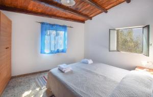 Letto o letti in una camera di Magia dell'Aspromonte