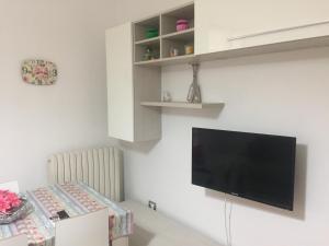 TV a/nebo společenská místnost v ubytování App sul lungomare