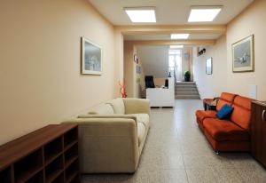 Posezení v ubytování Best Rest Guest Rooms