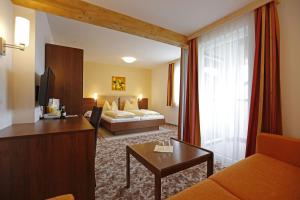 Postel nebo postele na pokoji v ubytování Premium Wanderhotel Steirerhof