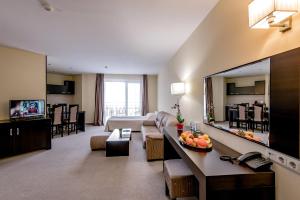 تلفاز و/أو أجهزة ترفيهية في Hotel Bellevue Ski & Relax - Half Board