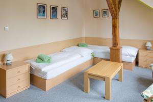 Postel nebo postele na pokoji v ubytování Apartmany A.Ša Kašperské Hory + 37 fotografií