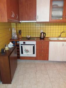 Кухня или кухненски бокс в Marmari vacation flat