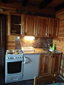 Una cocina o cocineta en Apartmani Milojević