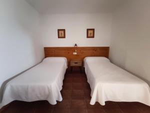 Cama o camas de una habitación en Complejo Apartamentos Rurales Molino de Abajo