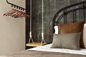 Postel nebo postele na pokoji v ubytování Maxime Boutique Hotel Avenida da Liberdade