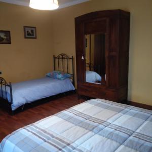 Postel nebo postele na pokoji v ubytování B&B Cascina Baraggione