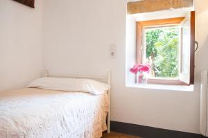 Posteľ alebo postele v izbe v ubytovaní Finca Pessal