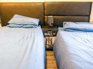 A bed or beds in a room at La Tavola Calda Hotel 