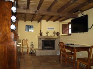 TV a/nebo společenská místnost v ubytování La Tanda