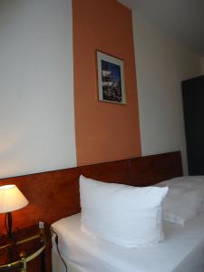 Cama o camas de una habitación en Hotel Burg-Stuben