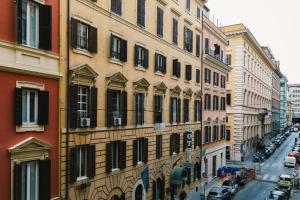 a view of a city street with buildings at A World Aparts - 55 Palermo in Rome