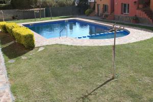 Bazén v ubytování casa cerca playa con piscina comunitaria ref 252 nebo v jeho okolí