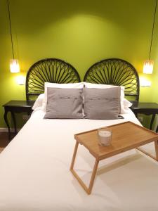 A bed or beds in a room at STUDIO 7