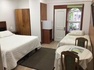 Cama ou camas em um quarto em Eco Hostal Offenbacher-Hof