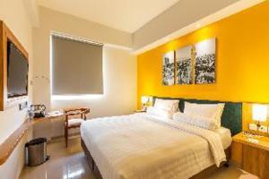 Letto o letti in una camera di Great Diponegoro Hotel Surabaya