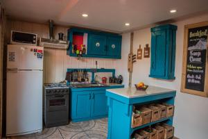 Dapur atau dapur kecil di Puma House