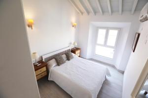 Postel nebo postele na pokoji v ubytování Apartamento Mar de Alborán