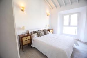 Postel nebo postele na pokoji v ubytování Apartamento Mar de Alborán