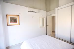 Postel nebo postele na pokoji v ubytování Apartamento Mar de Alborán