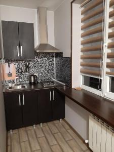 A cozinha ou kitchenette de Guesthouse na ulitze Mimoz 9