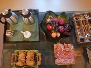 a table with a bunch of food on top at Il Gesuita in Mantova