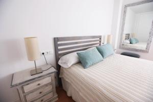Postel nebo postele na pokoji v ubytování Apartamento Rialto