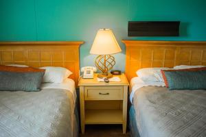 Llit o llits en una habitació de Kokopelli Inn