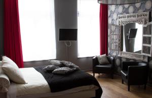 Postel nebo postele na pokoji v ubytování Hotel Matuchi