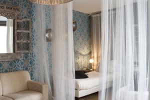 Postel nebo postele na pokoji v ubytování Hotel Matuchi