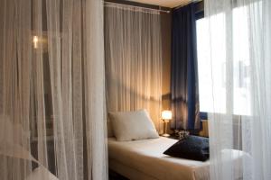 Postel nebo postele na pokoji v ubytování Hotel Matuchi + 24 fotografií