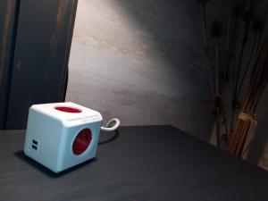 a white toaster sitting on top of a table at Postaláda vendégház in Salföld